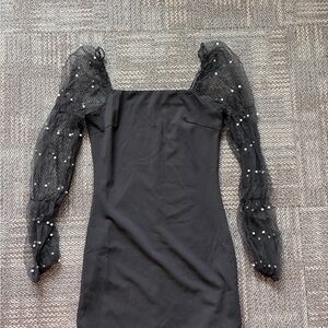 Chic Black Dress with Sheer Pearl accent Sleeves
